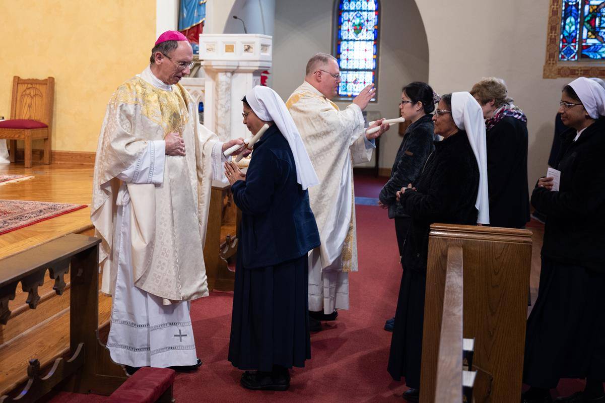 Giving St Blaise throat blessings in 2024