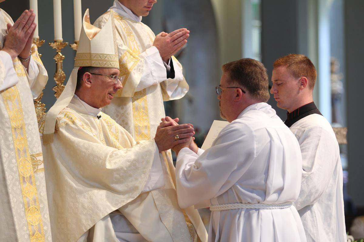 Bishop Jugis ordained 12 men as permanent deacons in 2021