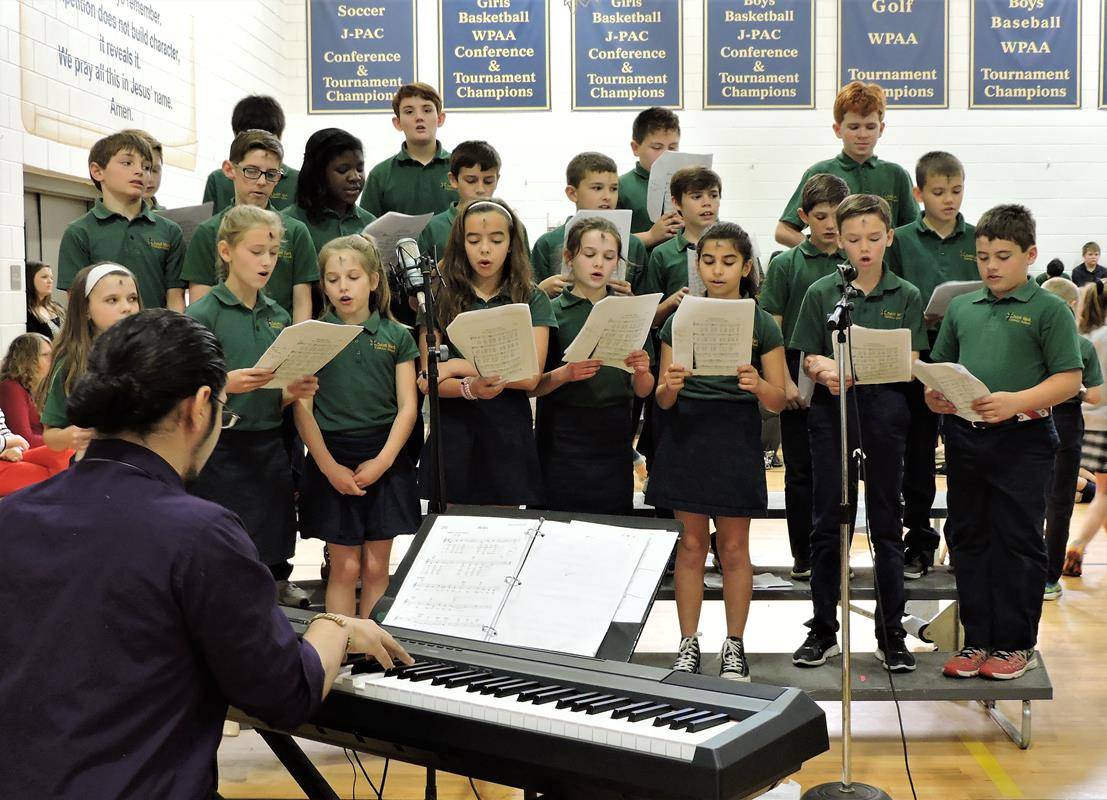 Students at St. Mark School receive ashes. 