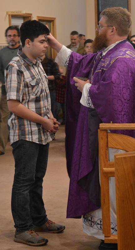 Ash Wednesday service at St. Mary, Mother of God Church in Sylva with pastor Father Joshua Voitus.