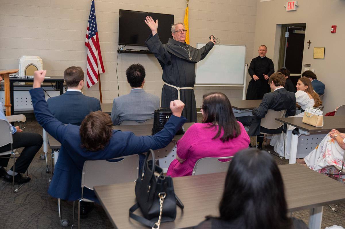 Bishop Martin immediately put everyone at ease asking the candidates who had the best confirmation sponsor.