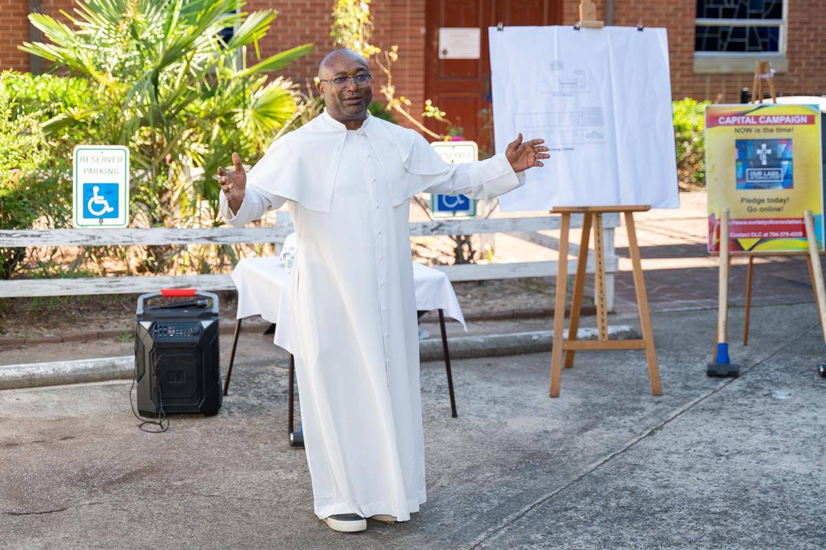 Father Basile Sede, Our Lady of Consolation pastor.