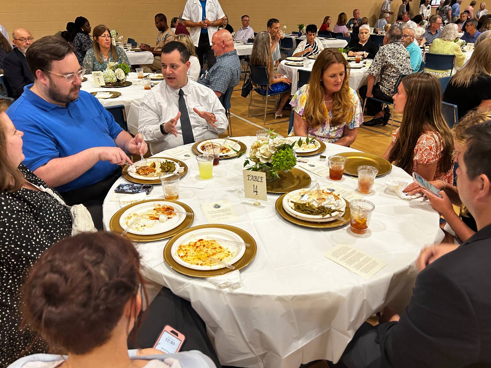 Members of the music ministry enjoyed celebrating together after they used their seraphic voices to praise the Lord at the anniversary Mass.