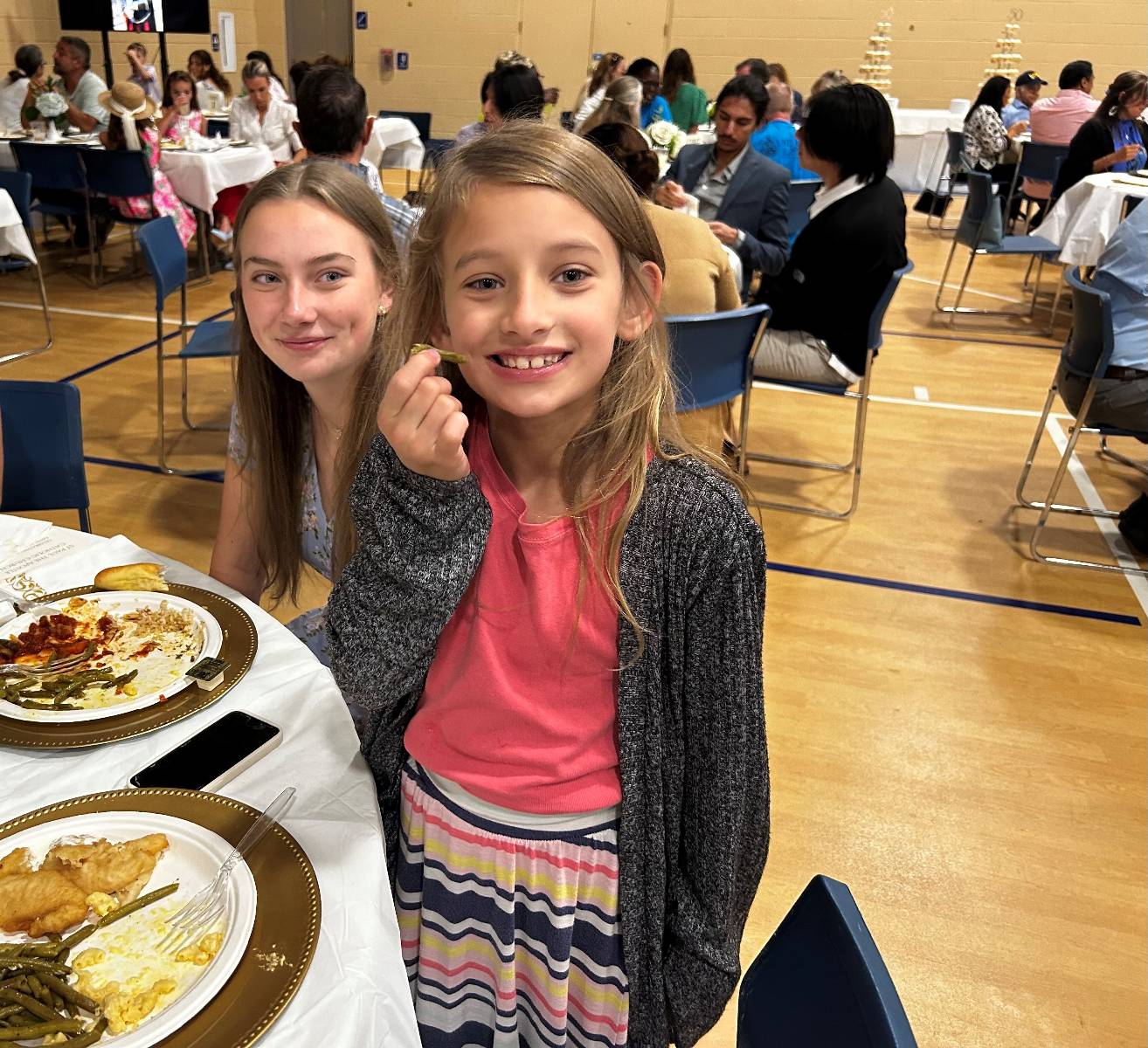 The young people of the parish enjoyed the celebration so much, they even ate their greens.