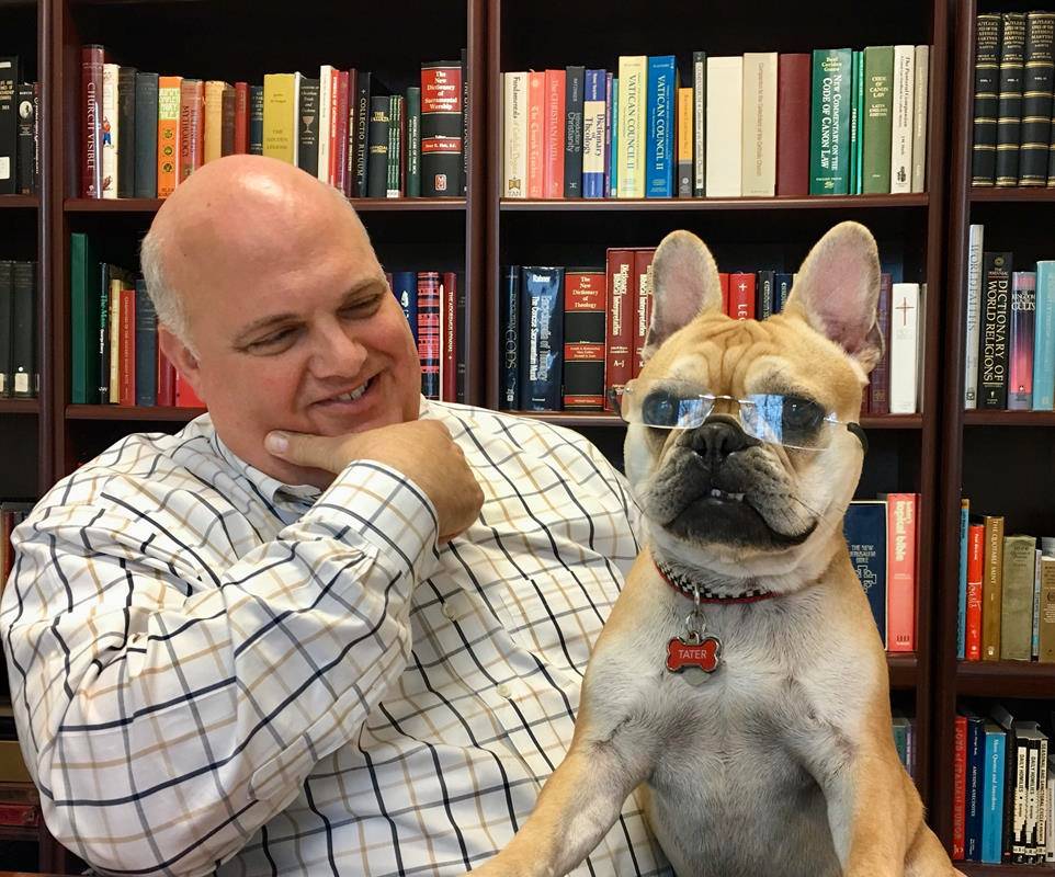 Tater was a conversation starter and helped people feel welcomed to the church. When his dad was out, he could be found frequently sitting in Monsignor Marcaccio’s desk chair.