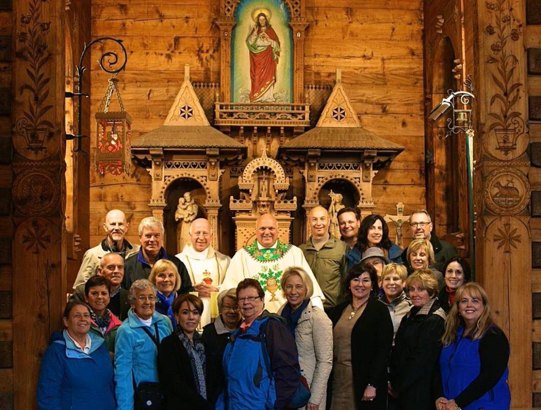  Monsignor Marcaccio leads parishioners on a pilgrimage.