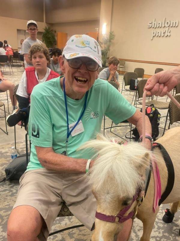 Camp SOAR founder Bob Bowler and his new pal Soleil.