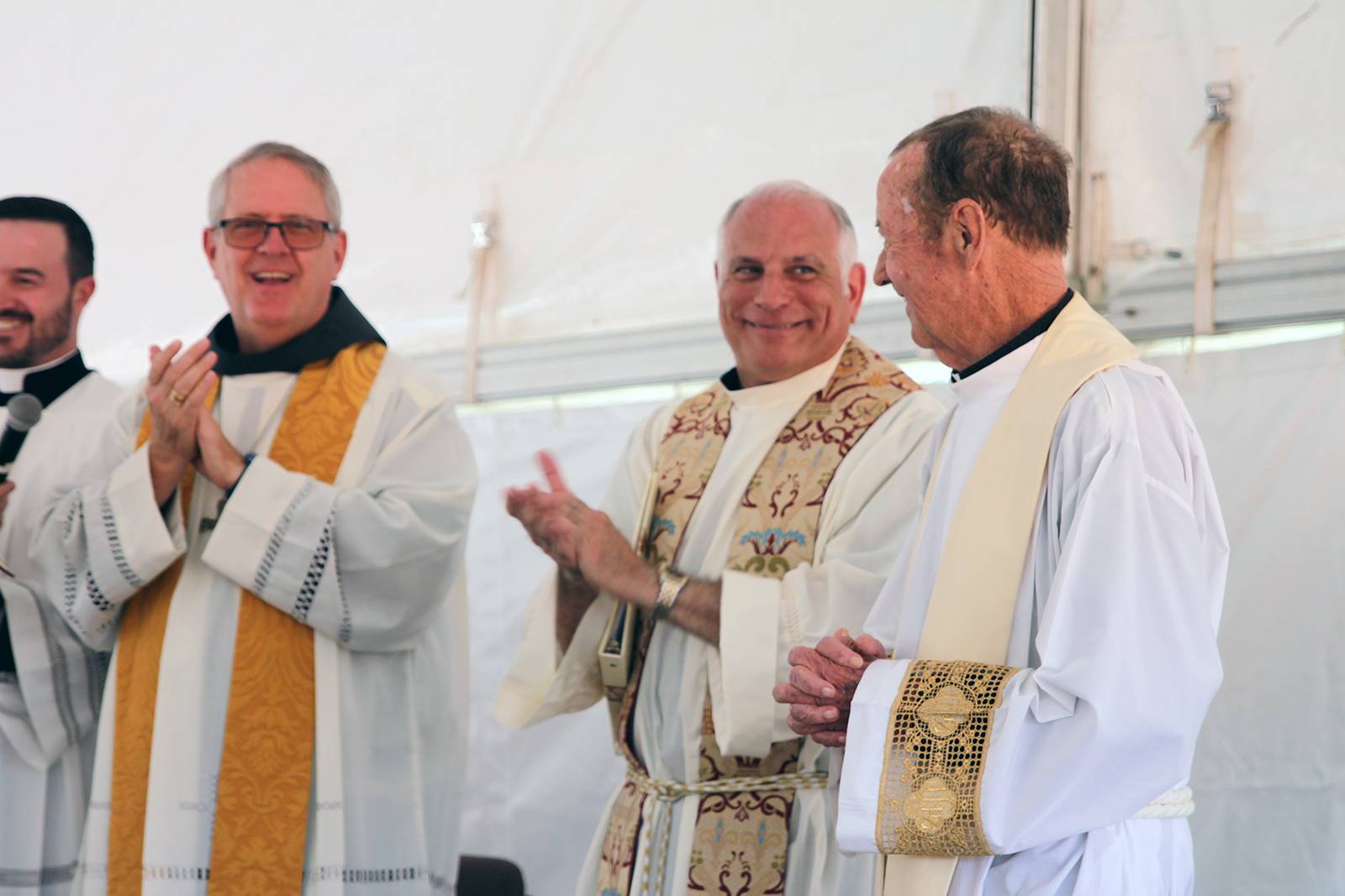 Monsignor John McSweeney, who was instrumental in buying the land for what would become Holy Spirit Church three decades ago, was warmly congratulated.