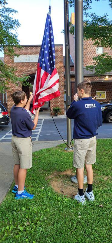 Students arrive for the first day at St. Mark School in Huntersville.