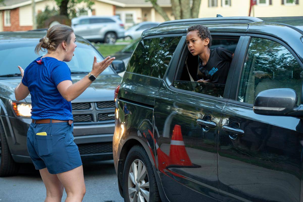 Lots of smiles on the first day of school at Our Lady of the Assumption School in Charlotte.