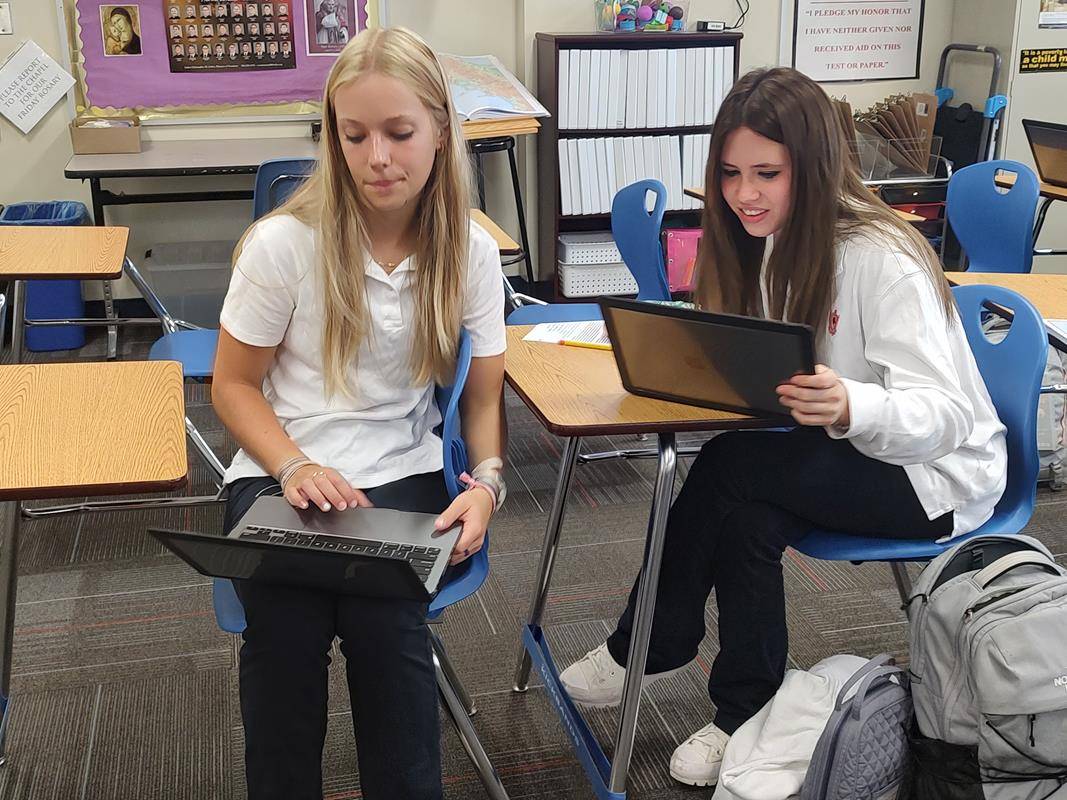 Students are getting settled in their classrooms on the first day of school at Charlotte Catholic High School.