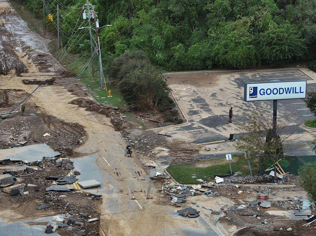 A drone view Sept. 29, 2024, shows rescue personnel working in a flooded area in Asheville, N.C., following the passing of Tropical Storm Helene.