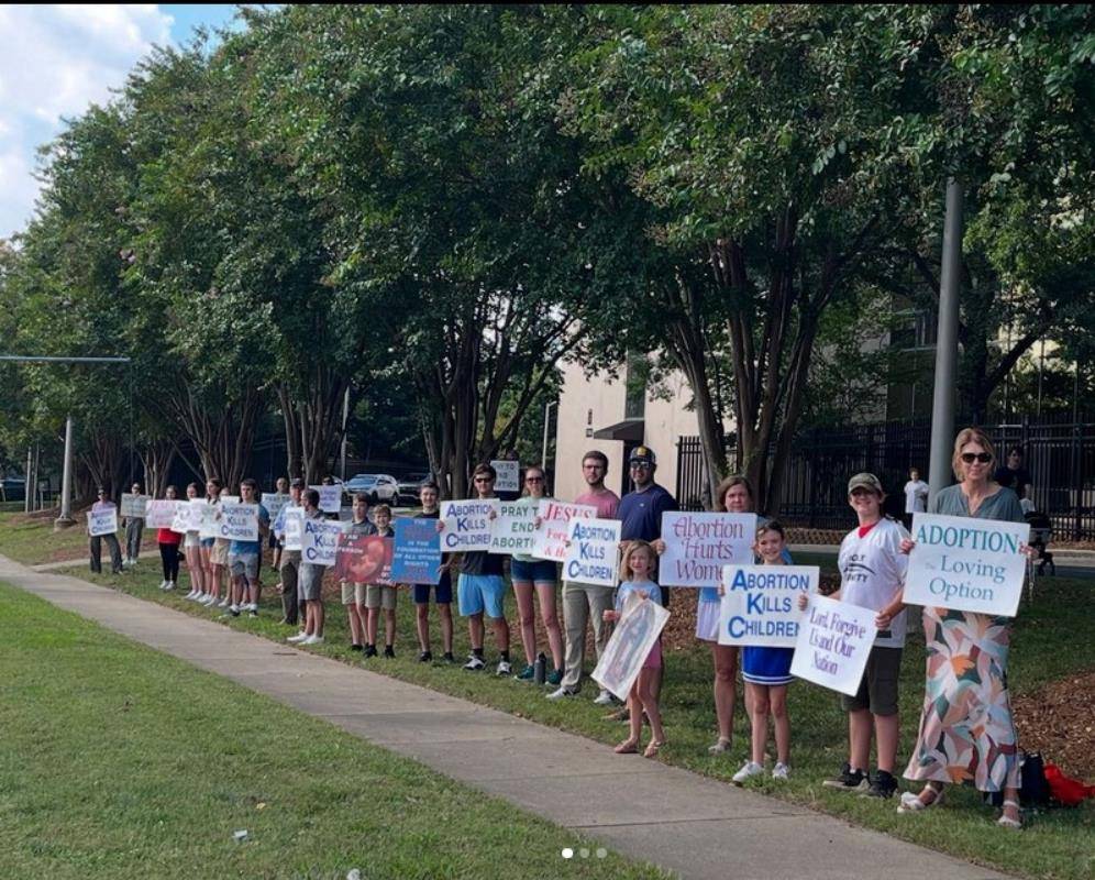 Life Chain in front of Charlotte Catholic High School on Pineville-Matthews Road in Charlotte.