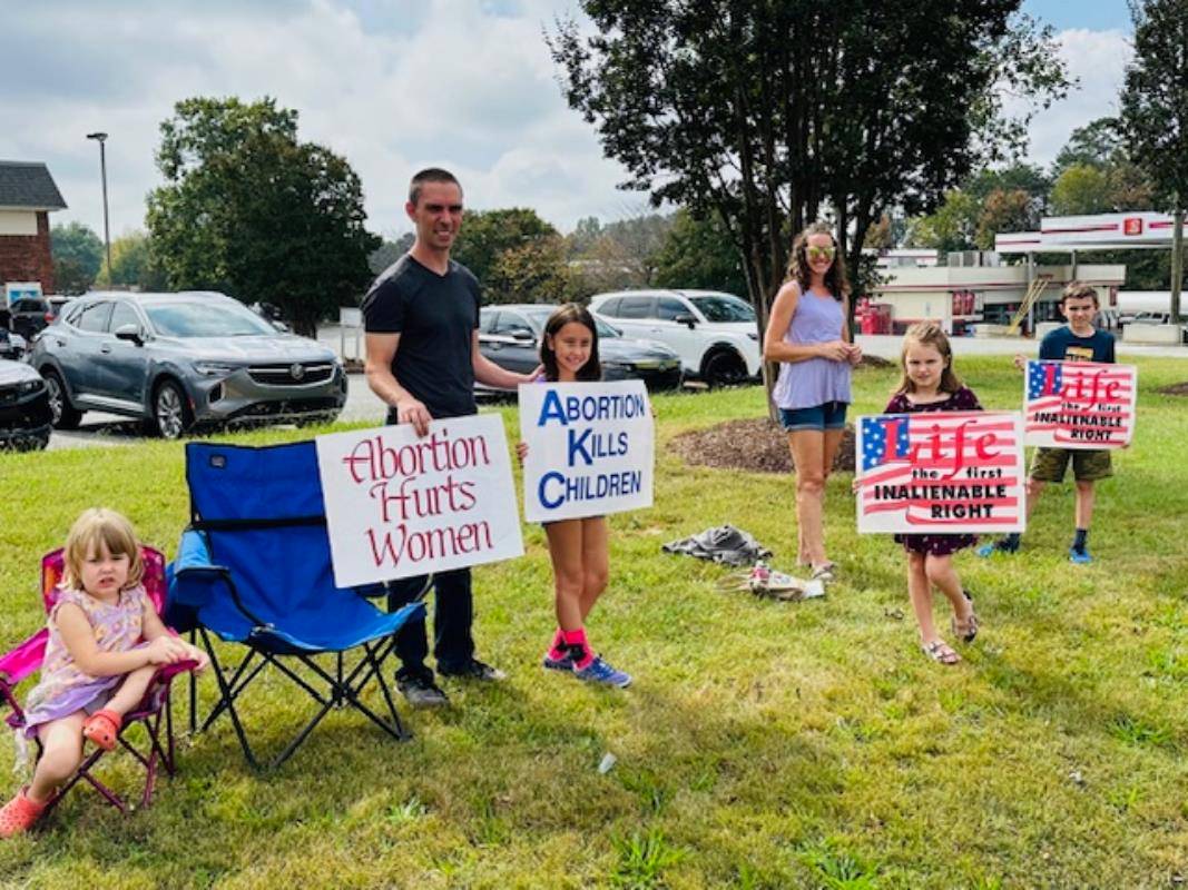 Supporters gather for a life chain at St. Therese Church in Mooresville.