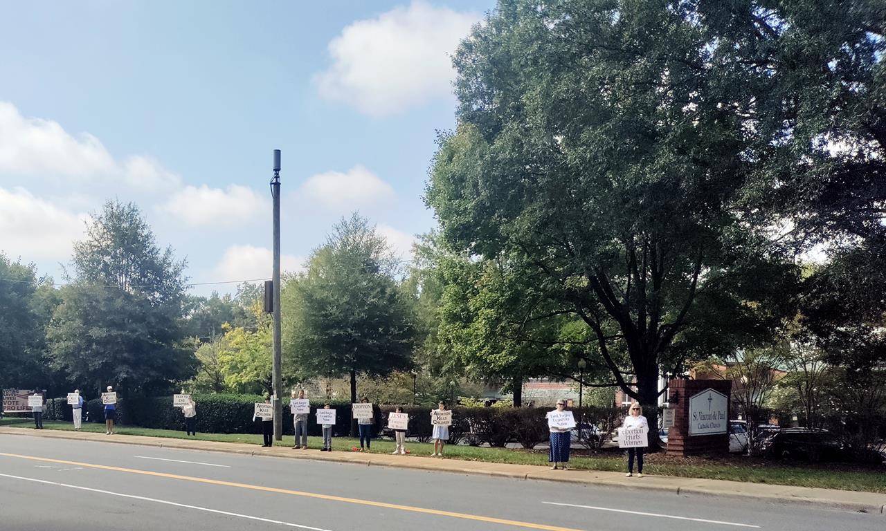 Life Chain in front of St. Vincent de Paul Church in Charlotte. 