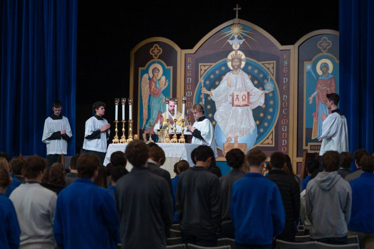 Students gathered for Mass after the procession, offered by Father Huber.