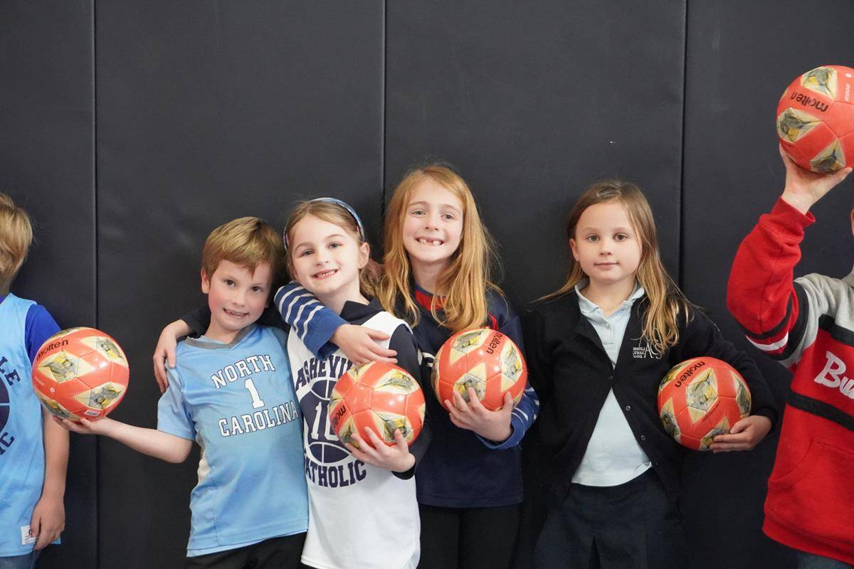 Students at Asheville Catholic School celebrate Catholic Schools Week with themed dress days: jersey, dress like a teacher and Hawaain-themed outfits started the week. 