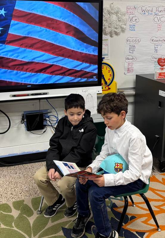 Immaculata Catholic School fifth-graders read books celebrating our nation to first graders during Catholic Schools Week.