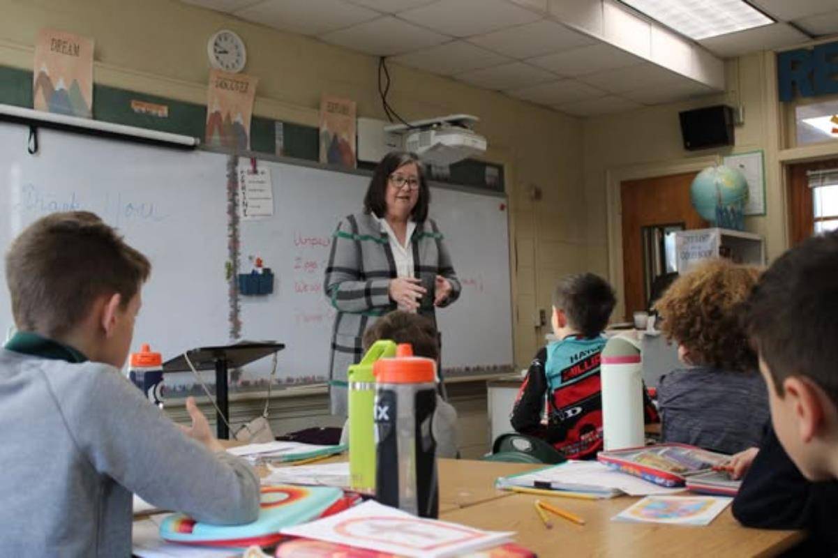Margaret Mary Yodzis with St. Leo the Great Church spoke with students at St. Leo School for Celebrate Your Community Day.