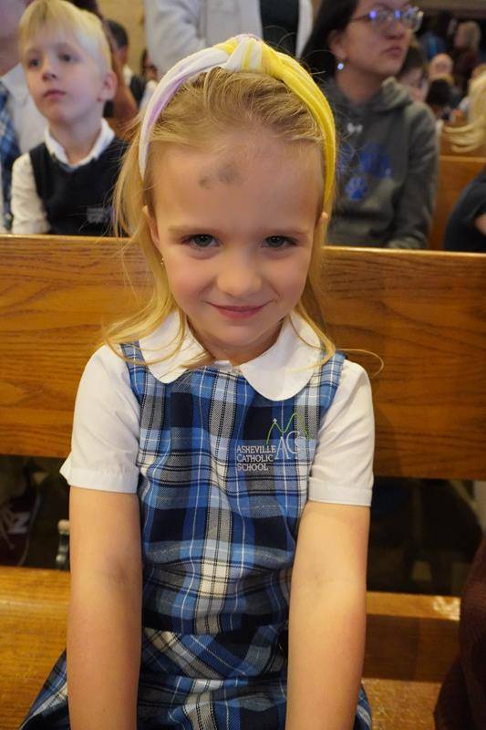 Students at Asheville Catholic School receive ashes for the start of Lent. 