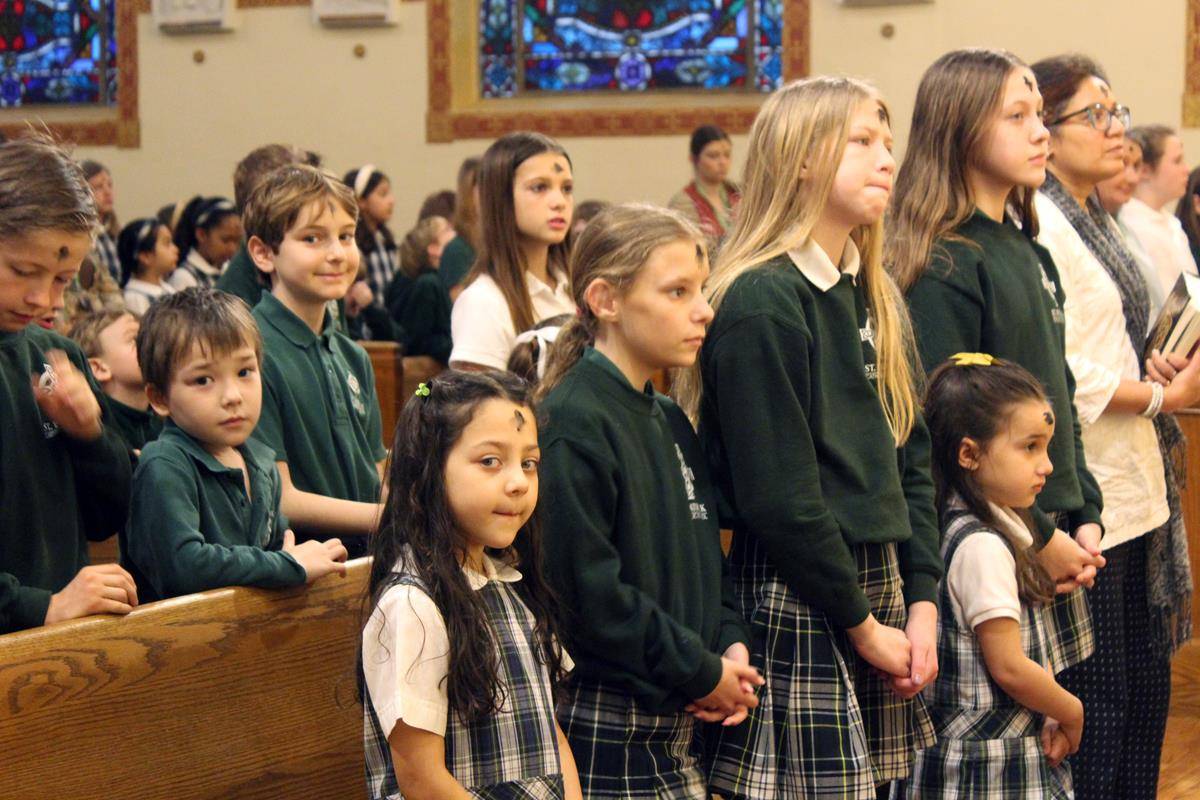 Students at St. Patrick School in Charlotte mark the start of Lent with Ash Wednesday with a school Mass at St. Patrick Cathedral.