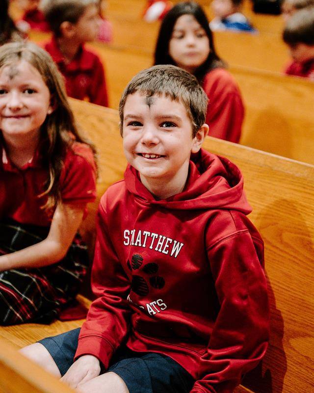 Students at St. Matthew School in Charlotte receive ashes for the start of Lent. 
