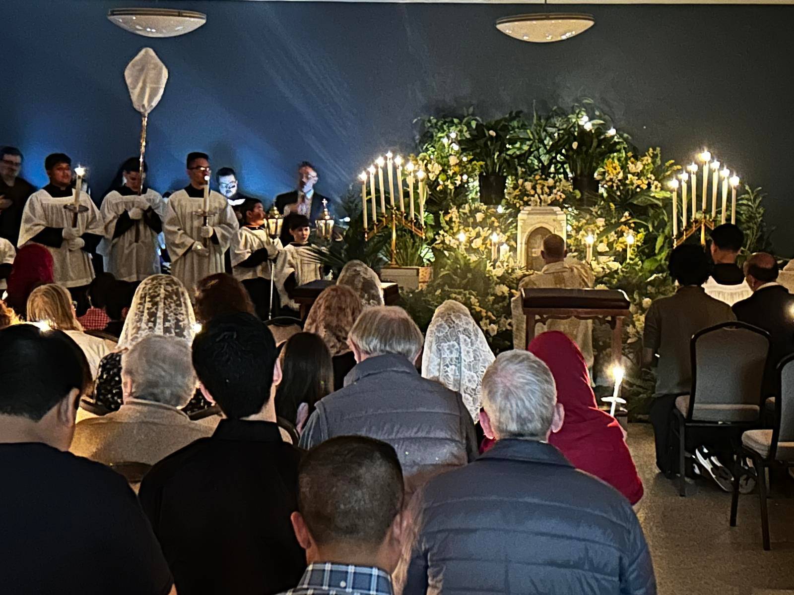 On Holy Thursday, the faithful at Our Lady of Grace parish pray at the Altar of Repose. (Photos by Annie Ferguson)