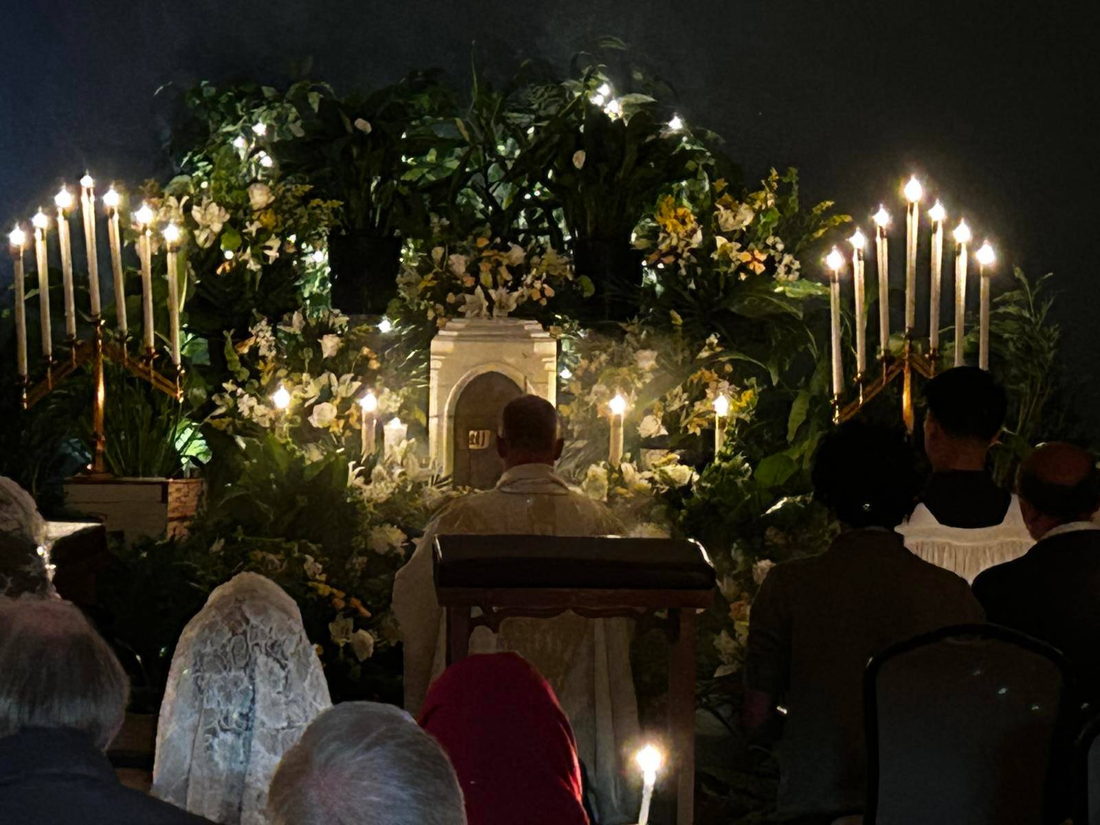 On Holy Thursday, the faithful at Our Lady of Grace parish pray at the Altar of Repose. (Photos by Annie Ferguson)