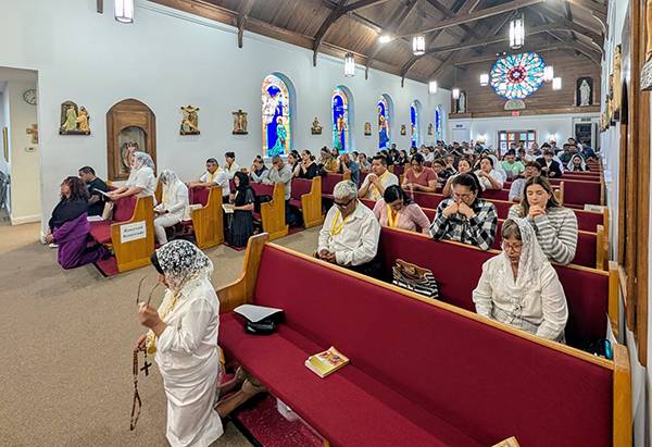 People gathered at Our Lady of the Highways Church in Thomasville Monday evening to pray for the pope. (Photo provided)