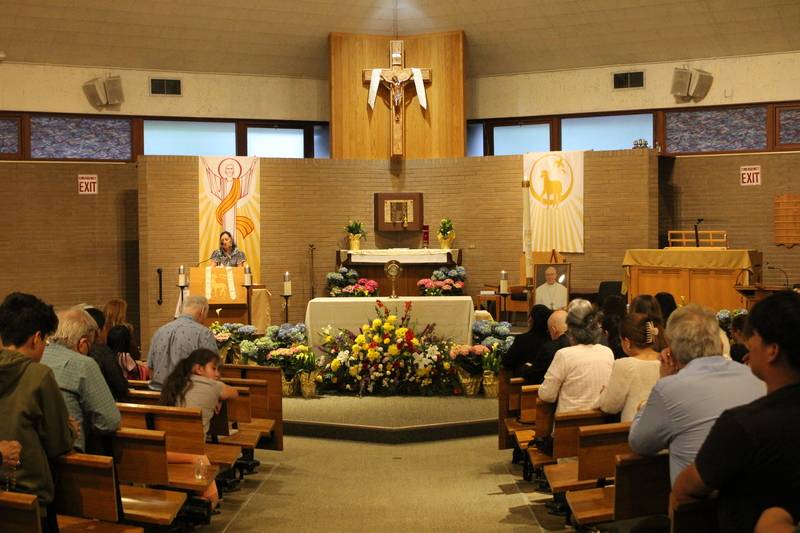People came to St. Eugene Church in Asheville Monday night to pray for the late pope. (Photo by Lisa Geraci)