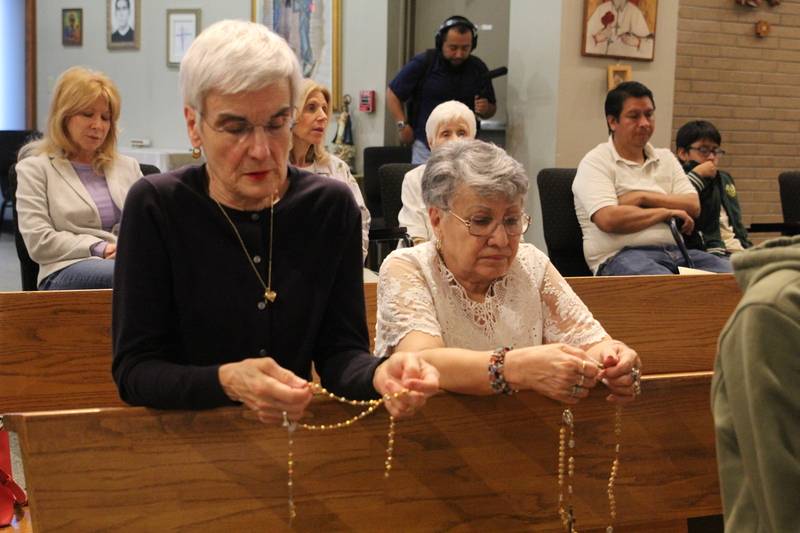 People came to St. Eugene Church in Asheville Monday night to pray for the late pope. (Photo by Lisa Geraci)