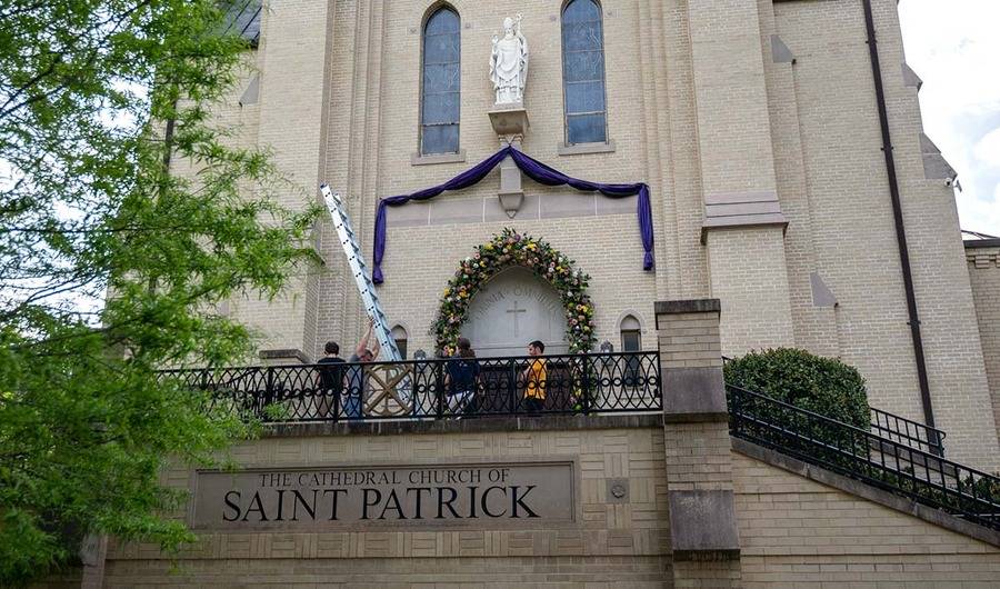 Bunting is draped over the entrance to St. Patrick Cathedral in Charlotte Monday morning following news of the death of Pope Francis. (Photo provided)
