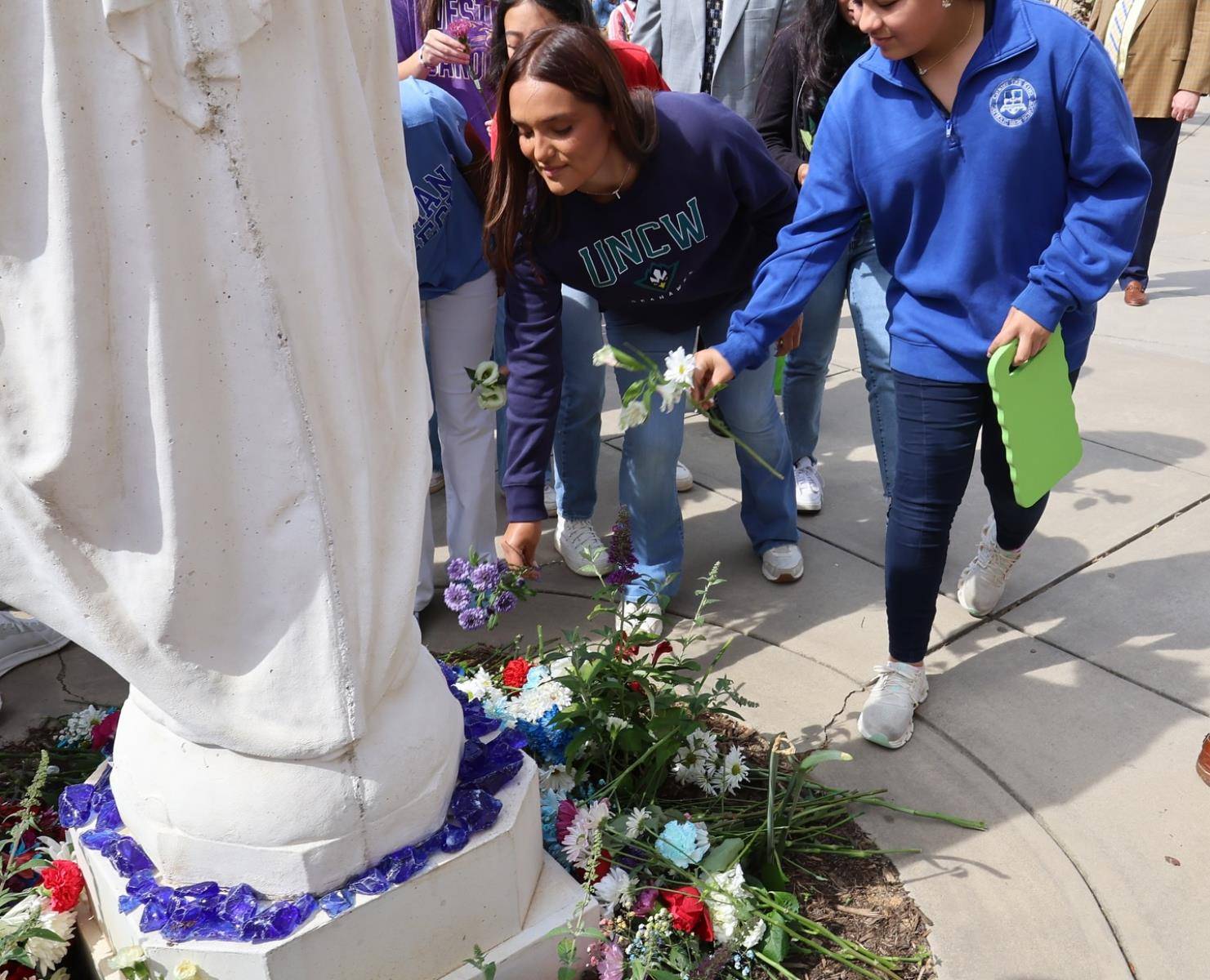 Together, students and staff prayed the Rosary and processed around campus, lifting their hearts in prayer and love.