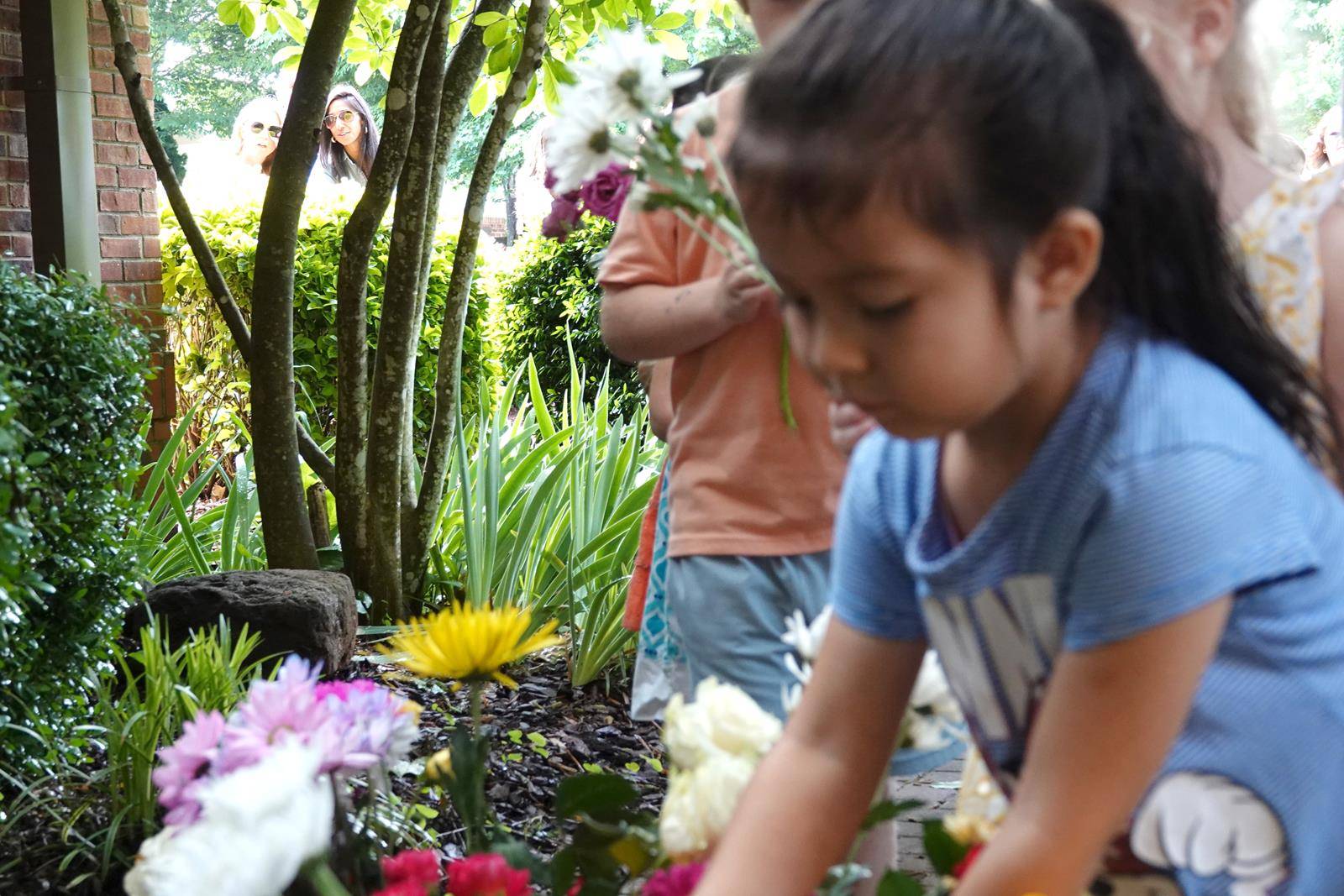 Father John Putnam lead all of the children and parents in prayer. 