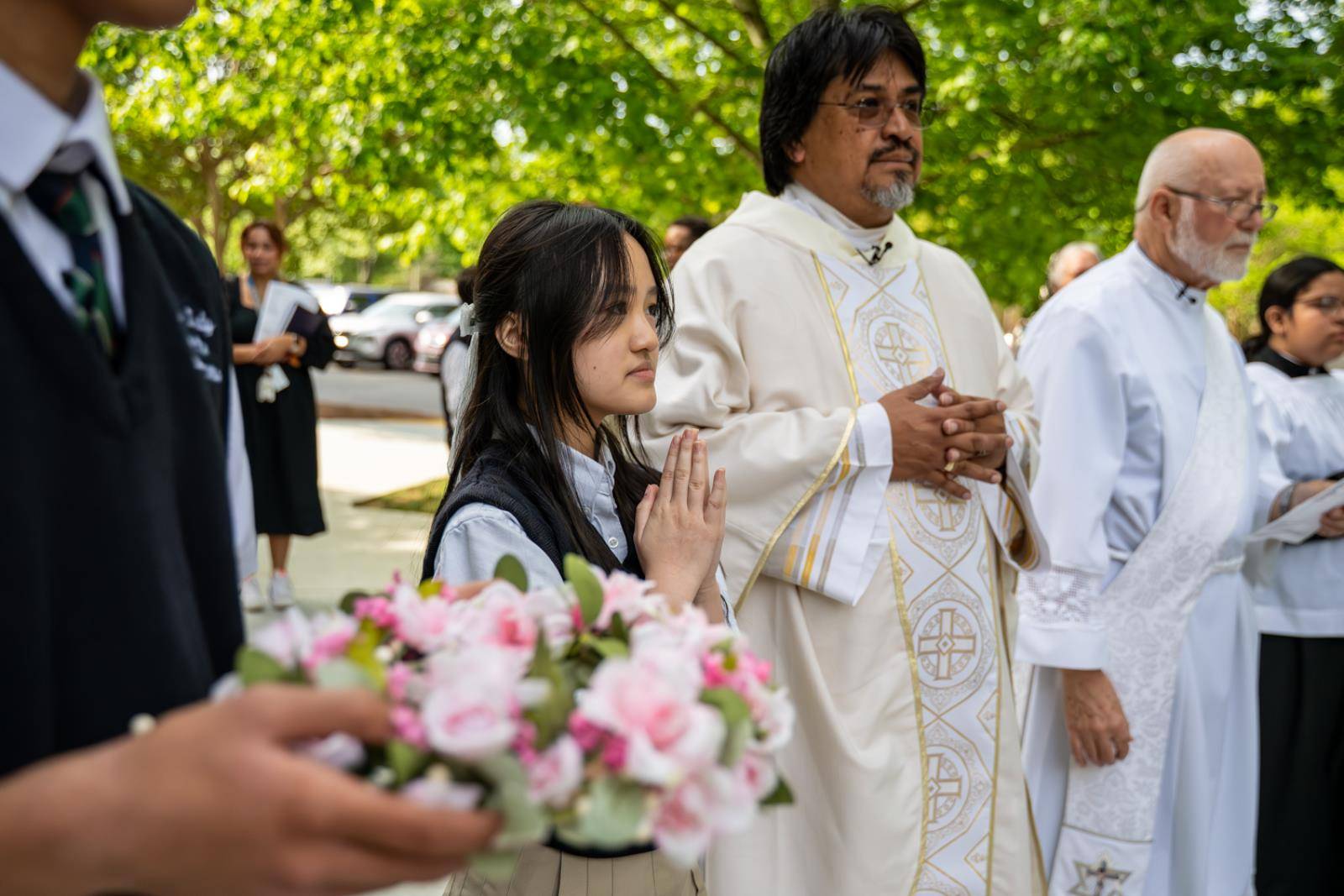 . The May crowning was led by Father José Enrique González Gaytán, pastor, with eighth-grader Christina Nguyen chosen to crown the statue. Nguyen has been a member of the OLA faith community since prekindergarten.