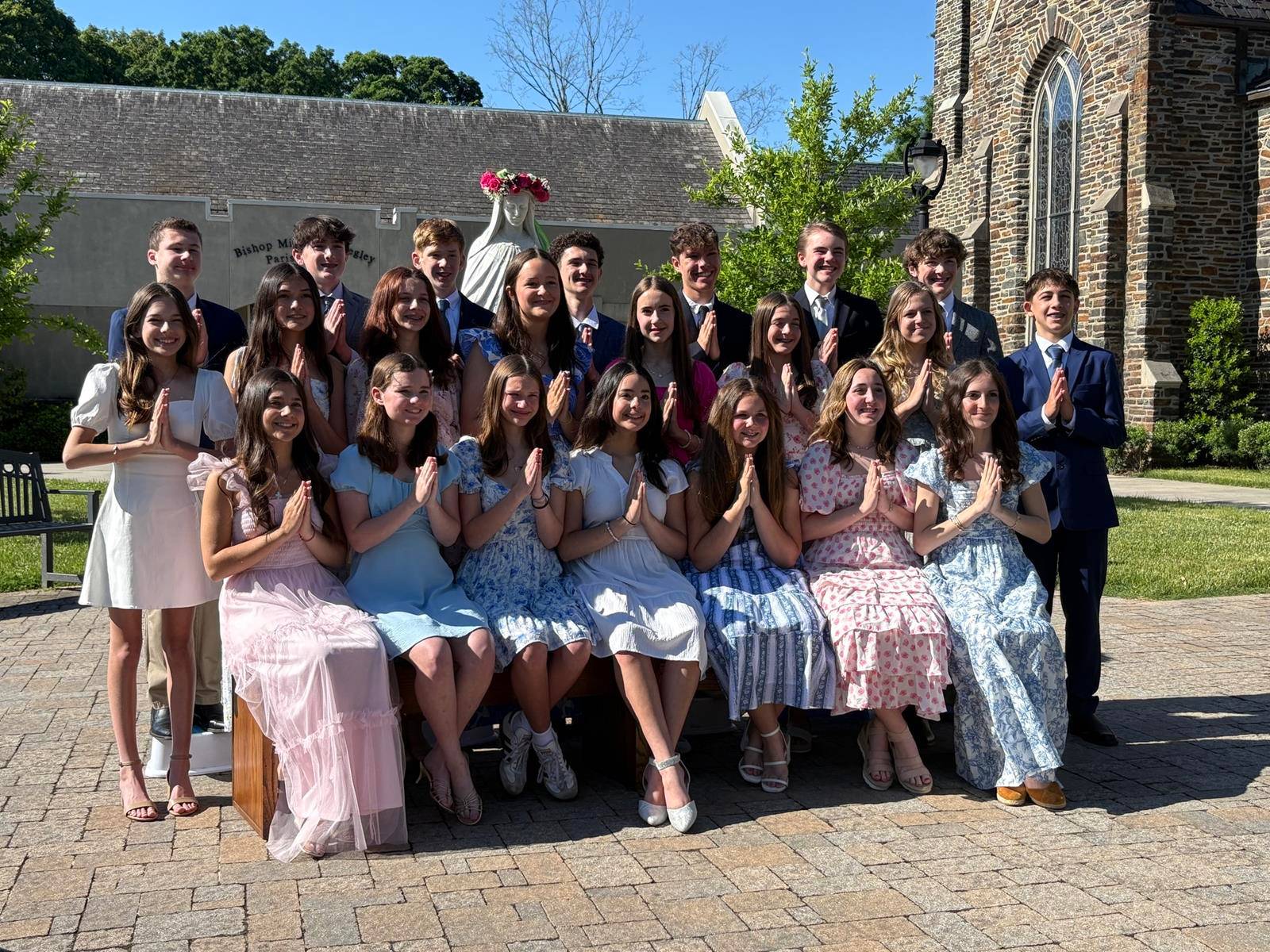St. Leo School holds annual crowning of Mary after its school Mass. 