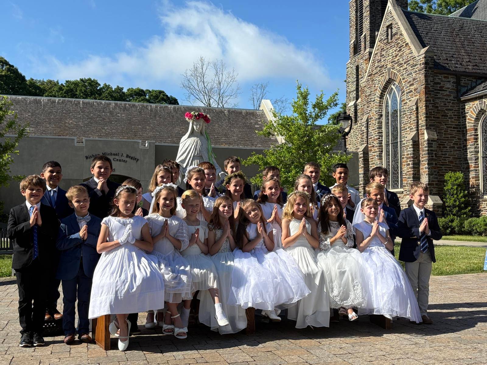 St. Leo School holds annual crowning of Mary after its school Mass. 