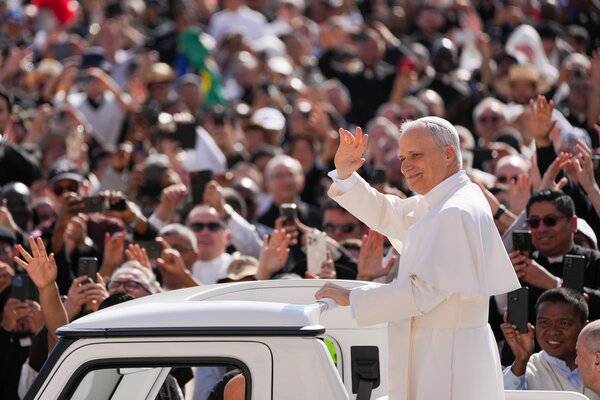 Pope Leo XIV enters St. Peter's Square on the popemobile before his installation Mass at the Vatican May 18. (CNS/Vatican Media)