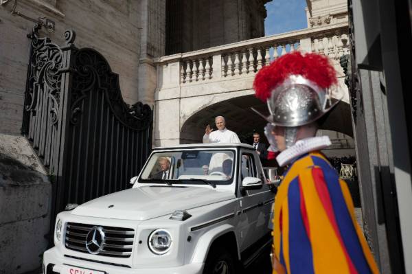 Pope Leo XIV enters St. Peter's Square on the popemobile before his installation Mass at the Vatican May 18. (CNS/Vatican Media)