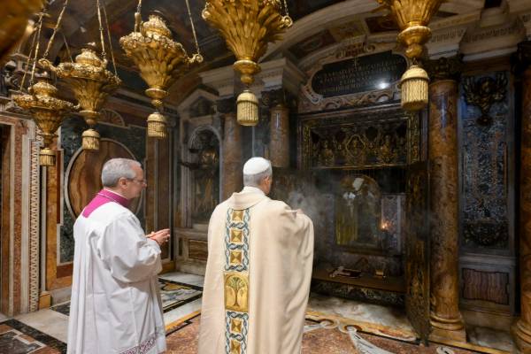Pope Leo XIV uses incense to venerate the tomb of St. Peter in St. Peter's Basilica before his installation Mass at the Vatican May 18. (CNS/Vatican Media)
