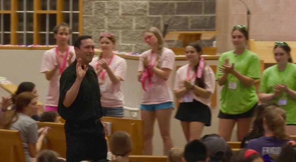 Father Patrick Cahill says goodbye to parishioners after 14 years serving as pastor at St. Eugene Parish in Asheville before moving to his new assignment as pastor of St. Matthew Parish in Charlotte. 