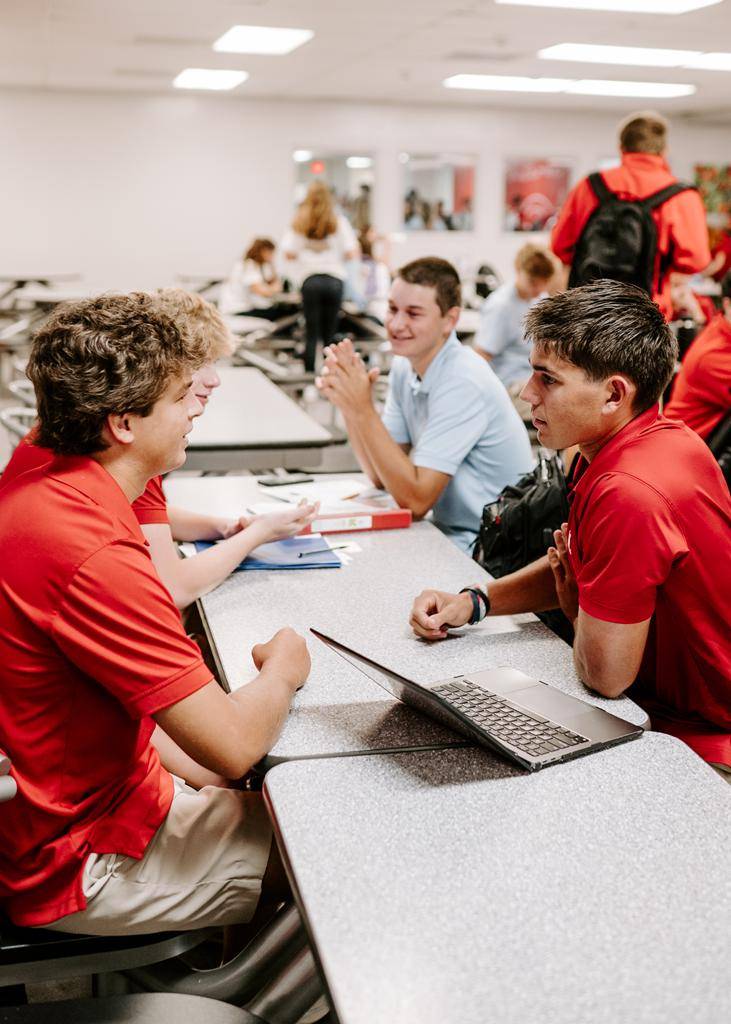 Students return to the school halls at Charlotte Catholic High School on the first day of school. 
