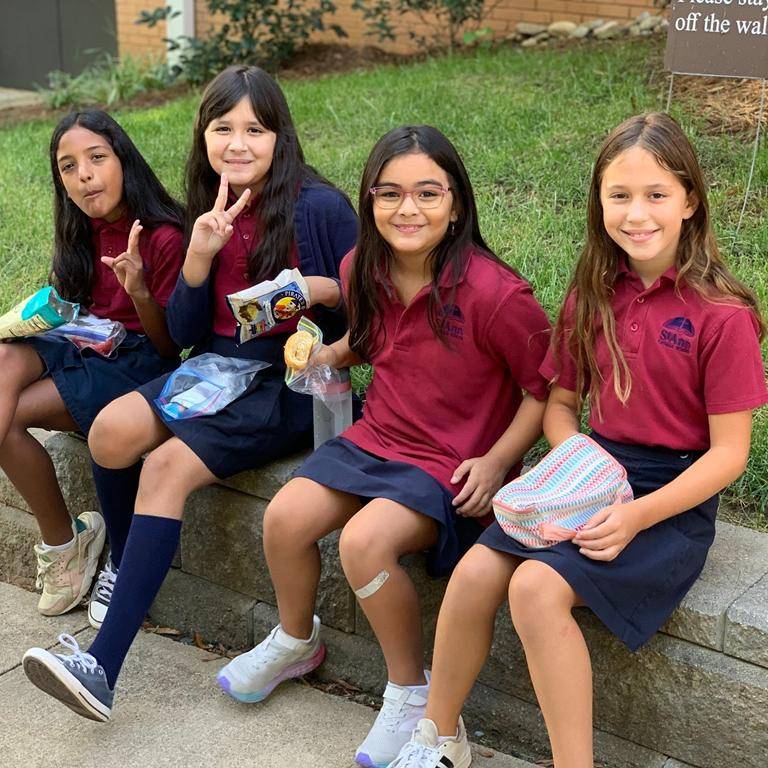 Students start the new school year at St. Ann School in Charlotte. 