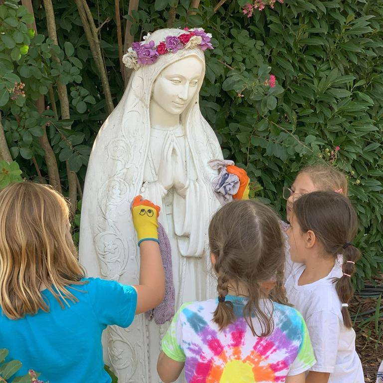 St. Ann students have been busy praying together, cleaning up Mary’s gardensand having fun learning and playing