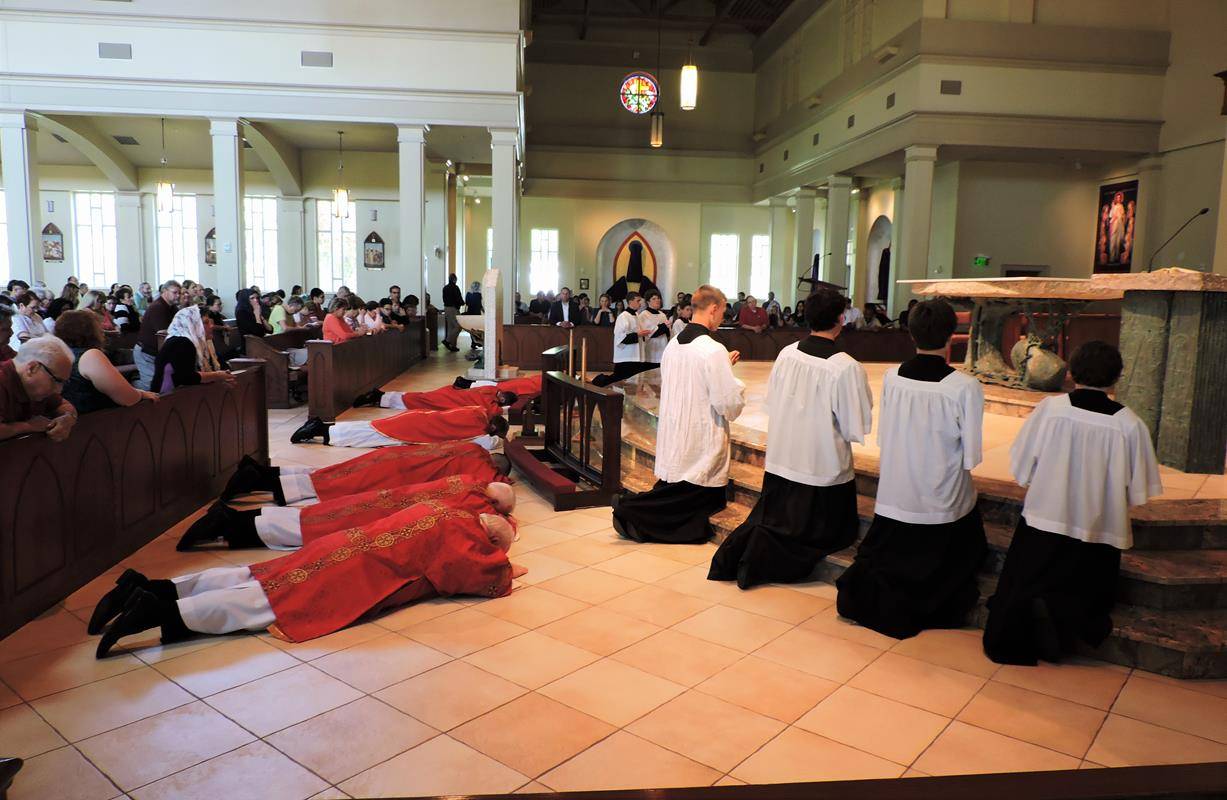 HUNTERSVILLE — Parishioners prayed the Stations of the Cross, then the Passion and then the Divine Mercy and Veneration of the Cross. (By Amy Burger) 