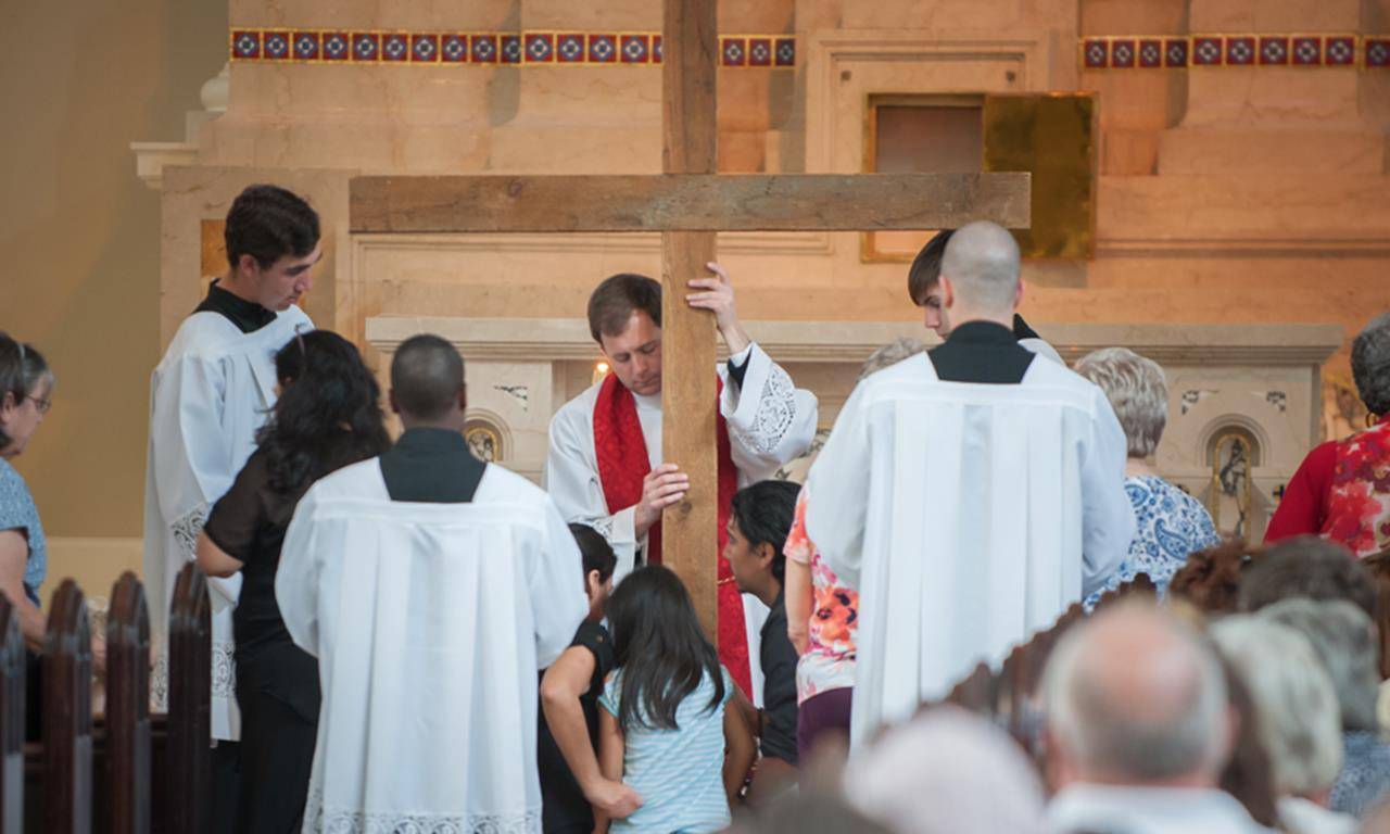 Passion Service Sacred Heart with Father John Eckert (By Bill Washington)