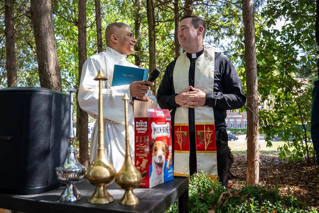 Father Patrick Cahill and Father Binoy Davis blessed cats, dogs, birds and even some reptile friends for the Feast of St. Francis of Assisi at St. Matthew Church in Charlotte. 
