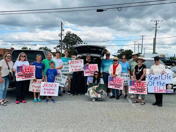 Faithful from St. Therese in Mooresville participate in a Life Chain on Respect Life Sunday.