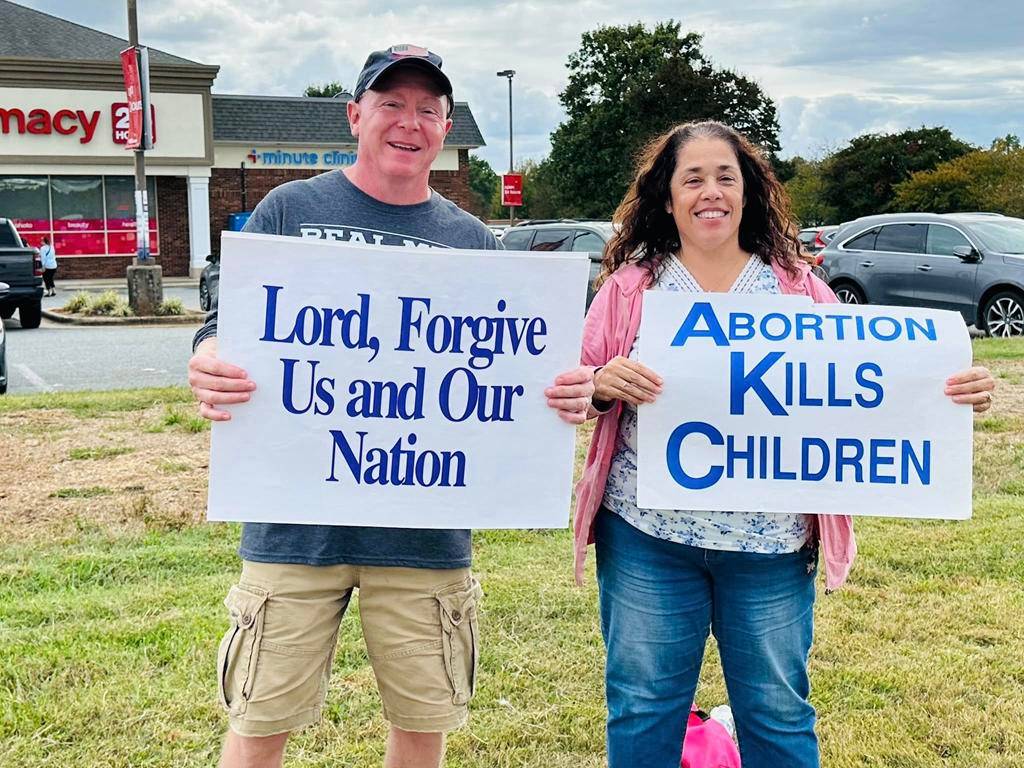 Faithful from St. Therese in Mooresville participate in a Life Chain on Respect Life Sunday.