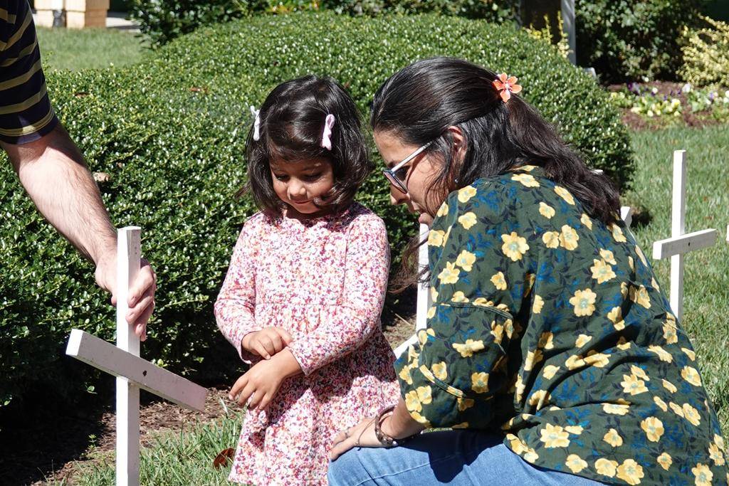 Faithful show support for life during a Life Chain outside St. Mark Church in Huntersville. 
